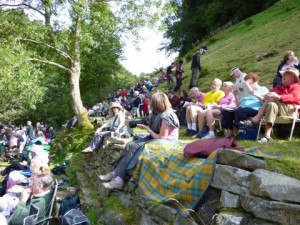 The audience grows larger and larger as the day progresses into beautiful sunshine